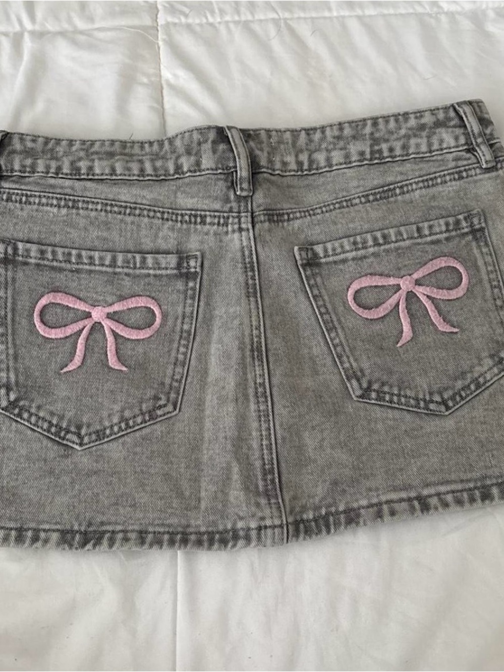 Ashley Mason Gray Denim Mini Skirt with Pink Bow Pockets